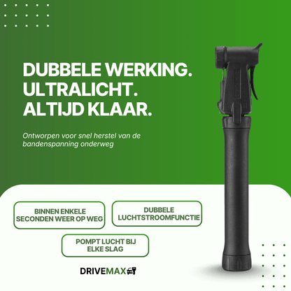 Schwarze DriveMax-Fahrradpumpe in Vorderansicht vor grünem Werbehintergrund.