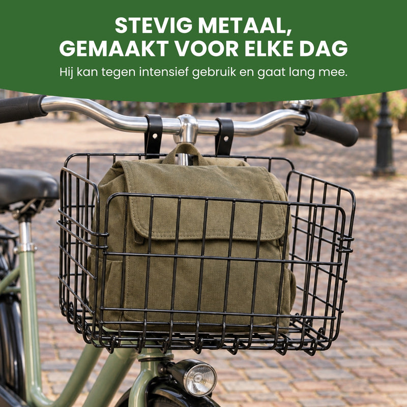Trego-Fahrradkorb aus der Nähe, mit einem grünen Rucksack hinter den schwarzen Metalldrähten: stabiles Metall, gemacht für jeden Tag