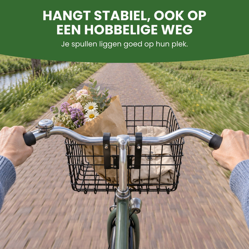 Vom Sattel aus: Trego-Fahrradkorb mit Blumen und einer Jacke, beide Hände am Lenker auf einem Landweg: hängt stabil, auch auf holprigen Wegen