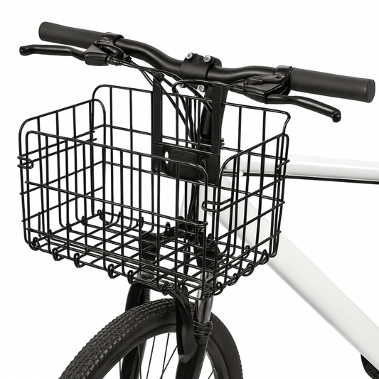 Zwarte opvouwbare metalen fietsmand van Trego bevestigd aan het stuur van een fiets, vooraanzicht.